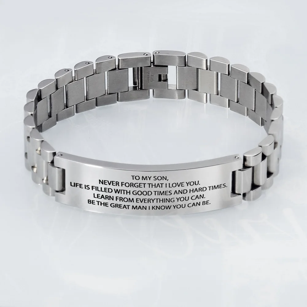 Silver-colored link bracelet with a multi-line example message on a curved panel